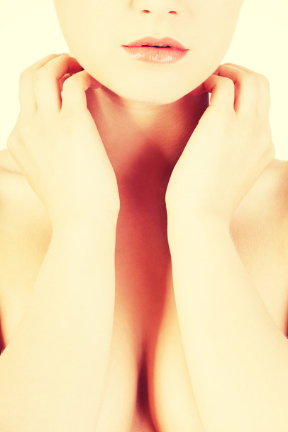 Beautiful sensual young woman touching her neck - Foto, Bild