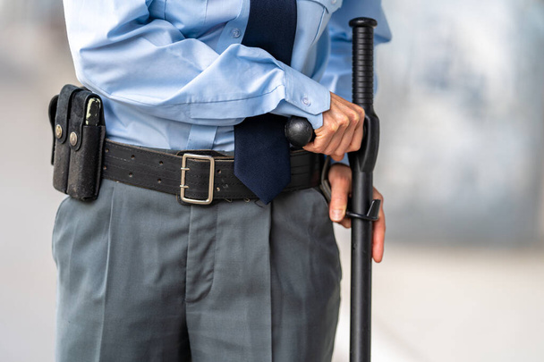 police equipment for defense and coercive means on the belt - 写真・画像