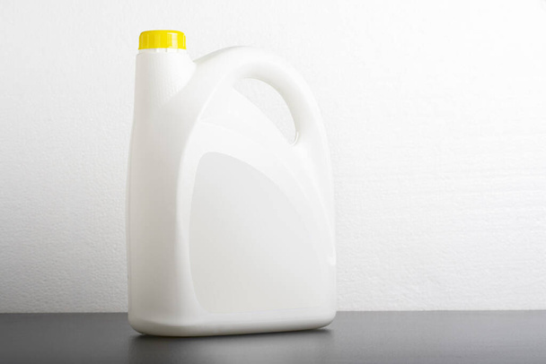 A kitchen detergent bottle in front of a light gray background, editable mock-up series ready for design, selection path included - Foto, Imagem