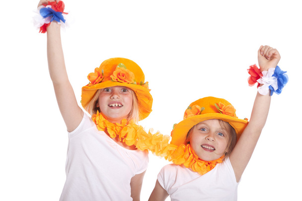 twee meisjes in oranje cheer - Foto, afbeelding