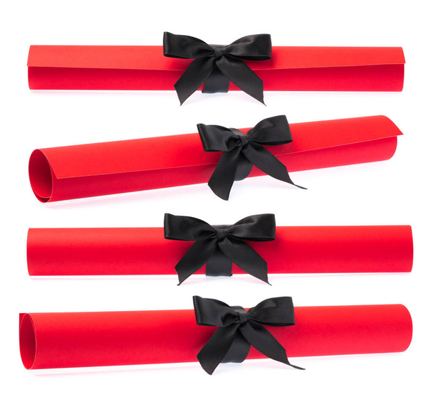 Collection of roll red paper with black ribbon isolated on white background - Photo, Image
