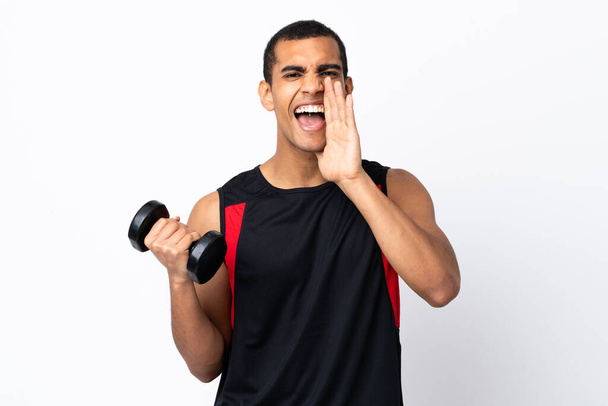 African American sport man over isolated white background shouting with mouth wide open - Φωτογραφία, εικόνα