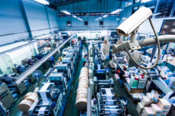 CCTV Camera or surveillance operating inside industrial factory - Photo, Image
