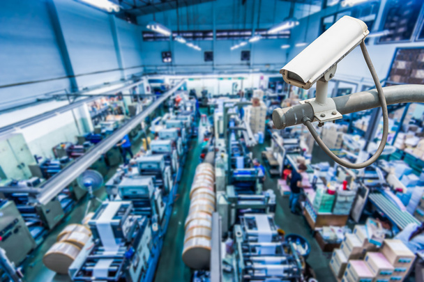CCTV Camera or surveillance operating inside industrial factory - Photo, Image