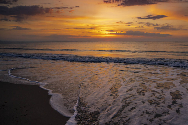A wonderful sunset over a sea - Фото, зображення