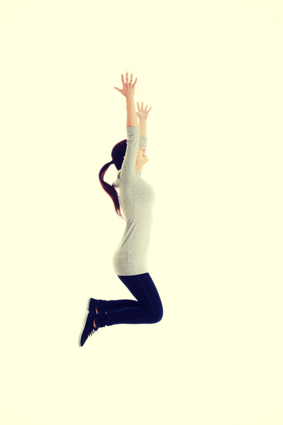 Woman jumping. - Фото, зображення