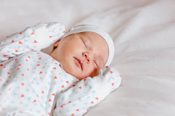 ten-day-old newborn baby in natural light close - 写真・画像