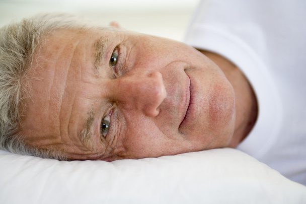 Man lying in bed - Zdjęcie, obraz