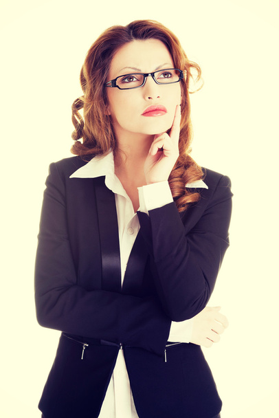Thoughtful business woman - Foto, afbeelding