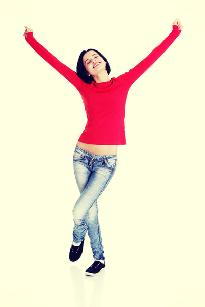 Excited young woman with fists up - Photo, Image