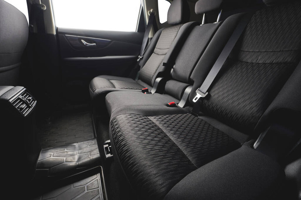 Clean black cloth car back seats with isolated windows - Photo, Image
