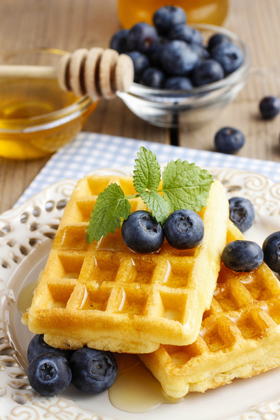 Waffles with syrup and blueberries - 写真・画像
