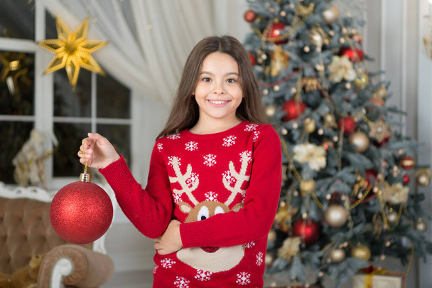 Happy girl celebrate Christmas and new year. Little child decorate christmas tree. New year decoration. Happy new year 2020. Merry Christmas - Фото, зображення