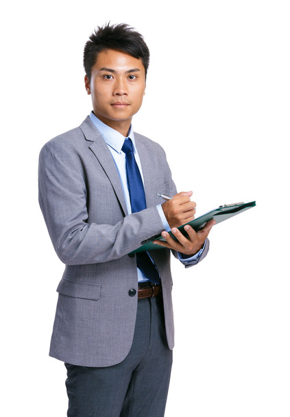 Business man with file pad - Foto, Imagem