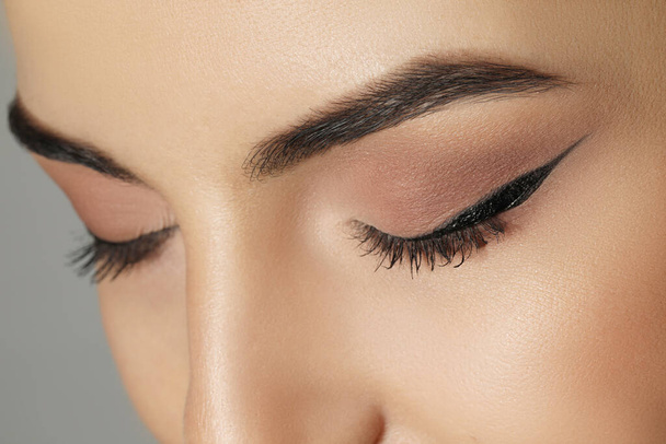 Young woman with beautiful eyebrows, closeup view - Foto, Imagem