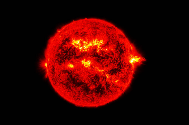 Sol estelar sobre un fondo oscuro. Elementos de esta imagen fueron proporcionados por la NASA. - Foto, imagen