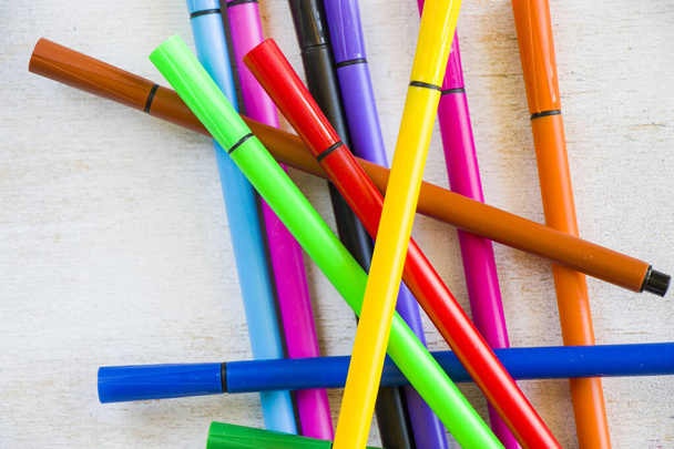 A closeup shot of a group of colorful art markers - Фото, изображение