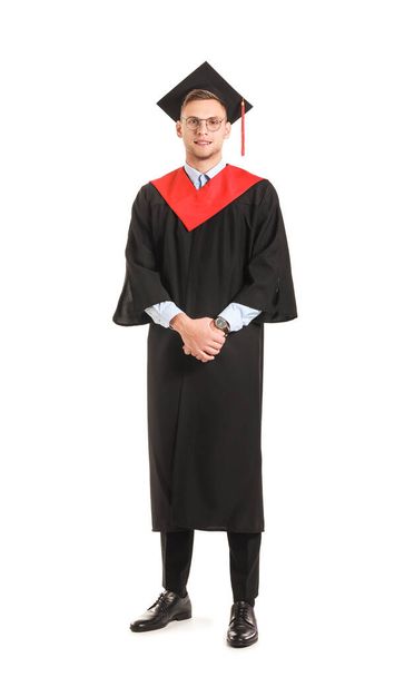 Male graduating student on white background - Valokuva, kuva