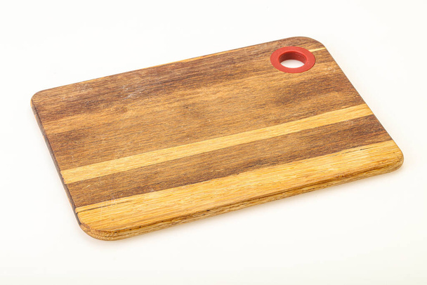Натуральна дерев'яна дошка для різання на кухні
 - Фото, зображення