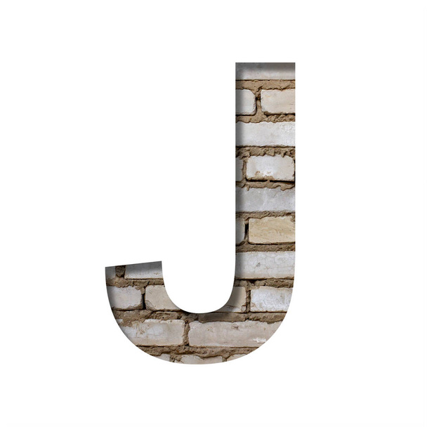Font on white brick. The letter J is cut from white paper the background of a sloppy white brick wall. Popular decorative fonts set - Foto, Bild