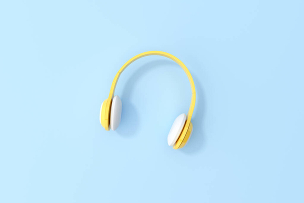 Cena de maquilhagem de fone de ouvido amarelo no fundo azul. Ideia conceitual mínima, renderização 3d. - Foto, Imagem