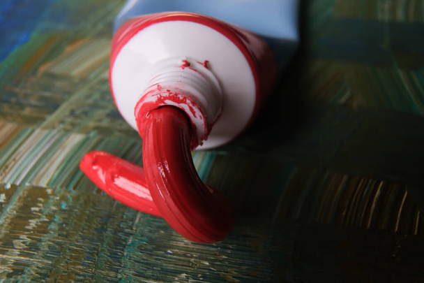 closeup photo of squeezed oil paint tube - Zdjęcie, obraz