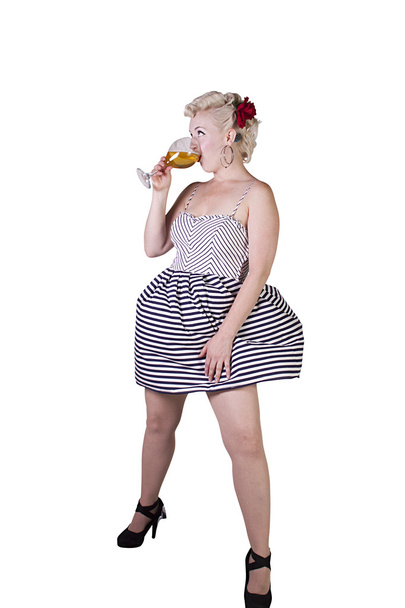 Woman in pin-up dress drinking - Isolated - Photo, Image