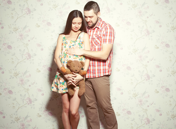 Stylish pregnancy concept: portrait of couple of hipsters (husba - Photo, image