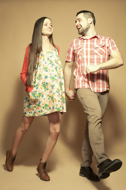 Stylish pregnancy concept: portrait of two happy hipsters (husba - Foto, Bild