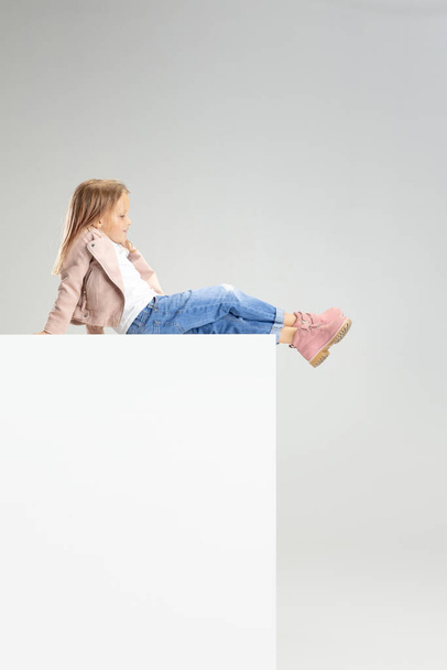 Caucasian girl isolated on white studio background. Copyspace. Childhood, education, emotions concept - Fotografie, Obrázek