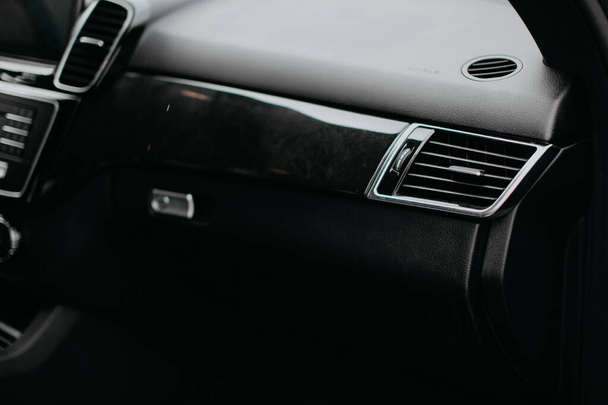 Luxury car air vents and air conditioning. Modern car interior. - Zdjęcie, obraz