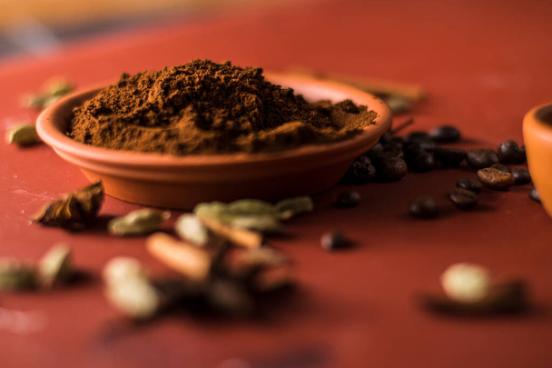 Ground fresh coffee beans on the table.fragrant arabica coffee. - Fotó, kép
