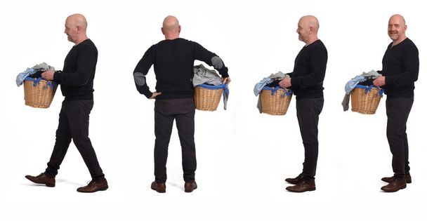gruppo di stesso uomo con un cesto di vestiti sporchi su sfondo bianco - Foto, immagini