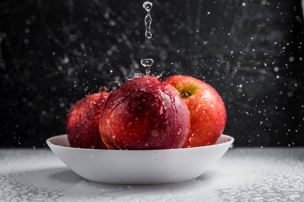 Fresh red apples with water drops. - Zdjęcie, obraz
