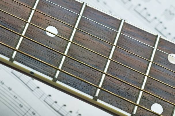 Fretboard de guitarra close-up
 - Foto, Imagem