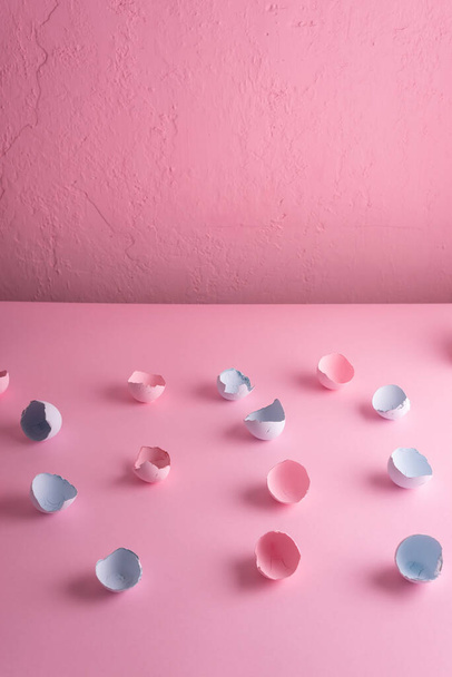 Easter eggshells, pink-blue flaley holiday. on a pink background. - Fotó, kép