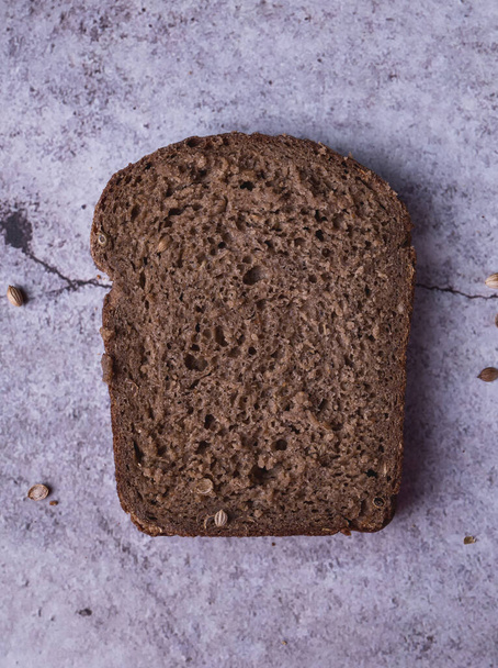 bread on black background. fresh bread - Фото, зображення