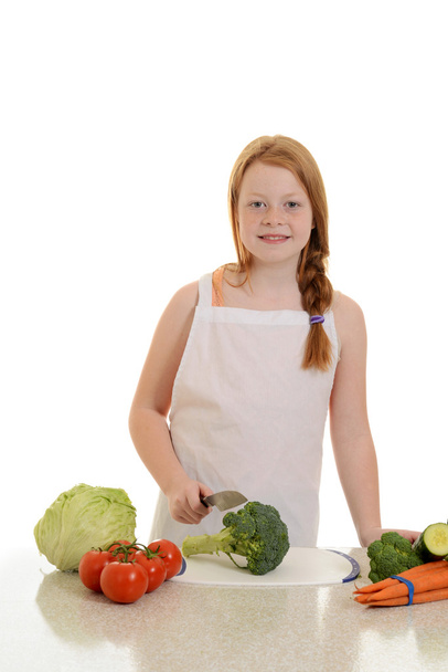 Girl cutting broccoli - Zdjęcie, obraz