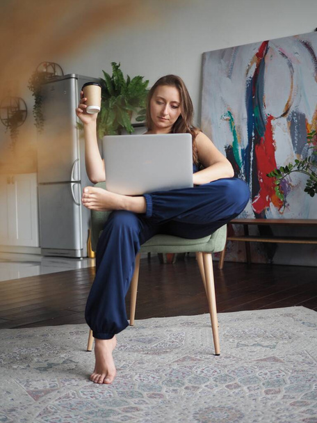 young woman working on a computer from home, remote work - Photo, Image