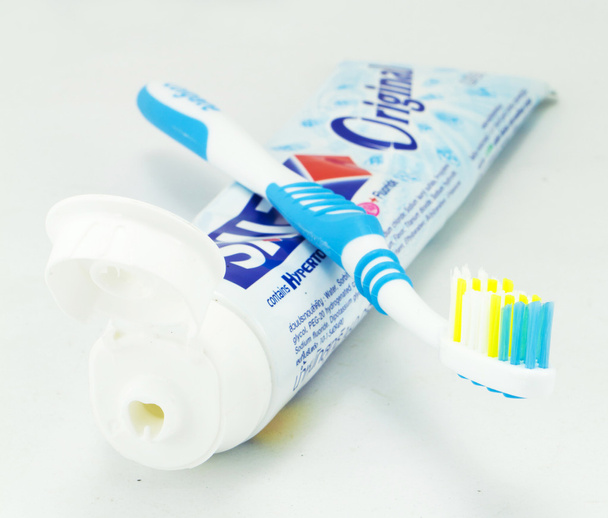 Toothbrush and toothpaste tubes - Photo, Image