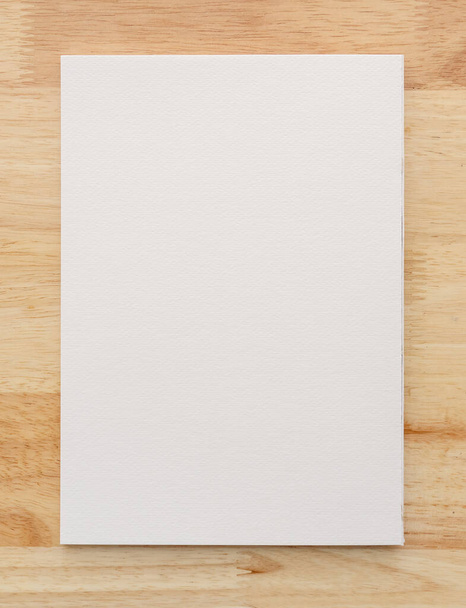 White paper texture on wood background. Close-up. - Foto, immagini