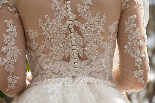 boutons sur la robe de demoiselle d'honneur sur le dos, robe de demoiselle d'honneur, mariage - Photo, image