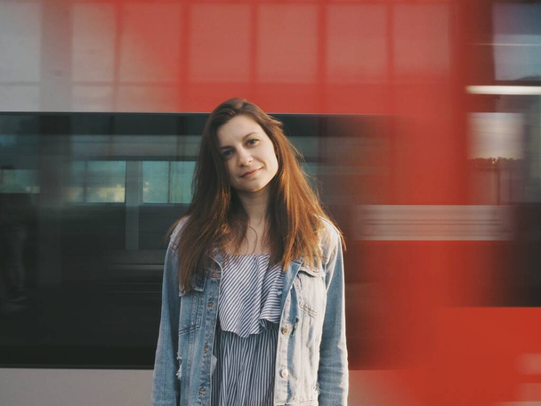 young woman in the subway, long exposure, oiled wagons - Fotografie, Obrázek
