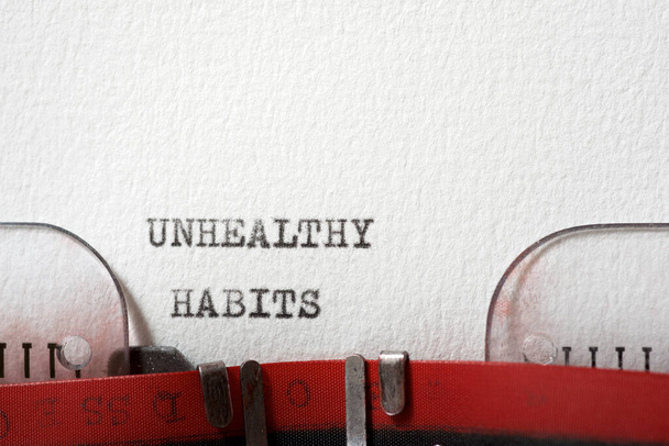 Unhealthy habits phrase written with a typewriter. - Fotografie, Obrázek