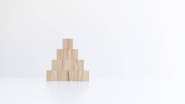 Wooden blocks on a white background where text can be inserted inside. - Фото, зображення