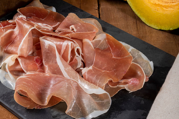 Parma ham (jamon) traditional Italian meat specialties. - Photo, Image