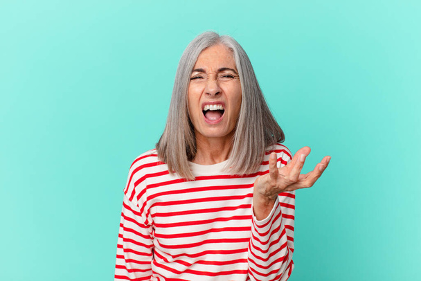 middle age white hair woman looking angry, annoyed and frustrated - Foto, imagen