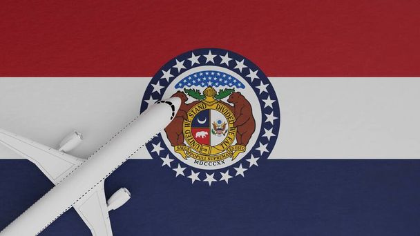 ミズーリ州旗の上の角にある飛行機のトップダウンビュー - 写真・画像