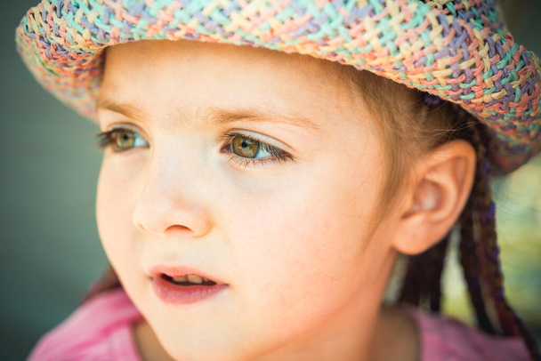 Sunny kid portrait. Kids positive emotions. Summer days. Closeup portrait of cute little girl. - Foto, Imagem