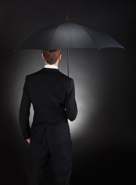 Businessman With Umbrella - Фото, изображение